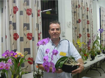  Steve with his Phalaenopsis.